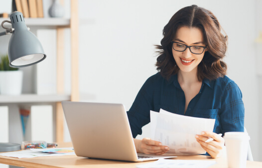 Woman with papers on hand